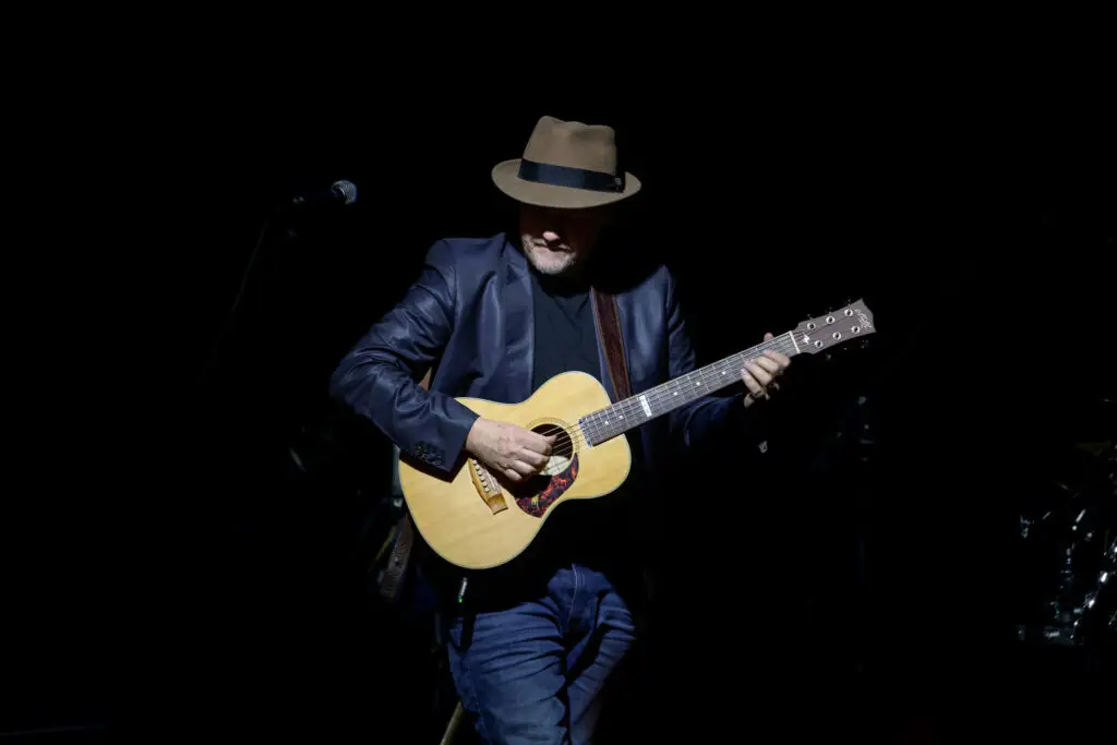 musician with acoutic guitar